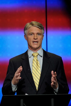 Libertarian candidate and and former CEO of a nano technology company Andrew Hunt is shown during a gubernatorial debate at WSB news studio, Sunday, Oct. 26, 2014, in Atlanta. (AP Photo/John Amis)