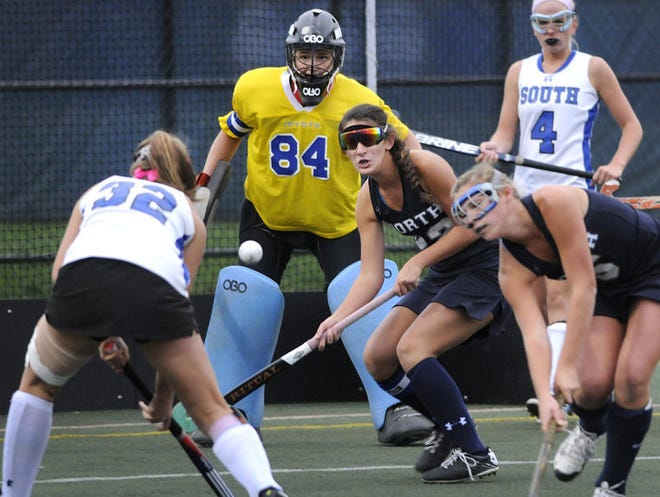 CR North Gigi Tutoni (center) looks to stop a shot in front of her goalie, Julia Singer (#84) taken by CB South's Steph Litzenberger (#32) in a District One semi-final game played on Wednesday at North Penn HS.