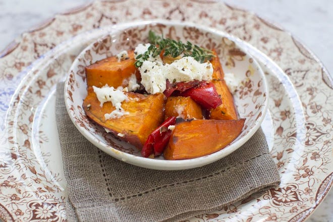This photo shows sweet potatoes with orange bitters. Chef Yotam Ottolenghi said that one issue with promoting vegetable-centric cuisine is winning over an audience that may have been traumatized by childhood experiences.