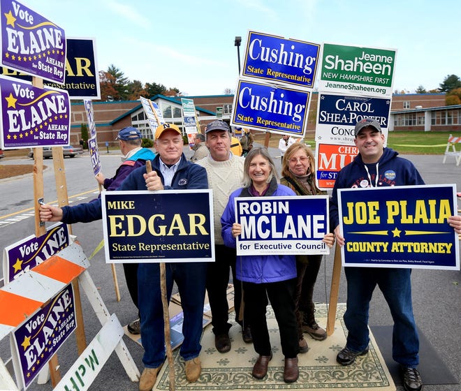 Candidates and supporters stand with signs to greet Hampton voters outside of Marston School on Election Day on Tuesday.

Ioanna Raptis/Seacoastonline