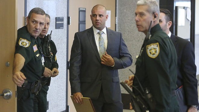 Anthony Giglio is led to a Palm Beach County court room Monday, where he plead guilty to DUI manslaughter in a February 2013 accident that claimed the life of Sandy Suarez. (Damon Higgins / The Palm Beach Post)