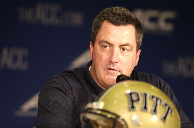 Pittsburgh head coach Paul Chryst answers a question during a news conference at the Atlantic Coast Conference Football kickoff in Greensboro, N.C., Monday, July 21, 2014. (AP Photo/Chuck Burton)