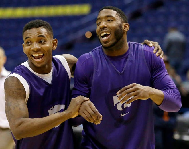 Kansas State's Jevon Thomas, left, and teammate Omari Lawrence joke at the end of practice prior to their NCAA Tournament appearance in March. Thomas was njot allowed to practice with the Wildcats during the first semester last season.