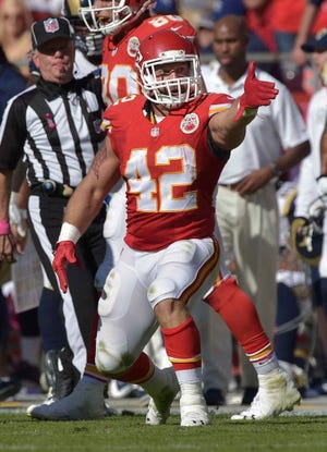 Kansas City Chiefs fullback Anthony Sherman celebrates a first down during a game against the St. Louis Rams at Arrowhead Stadium. Sherman signed a three-year extension Tuesday.