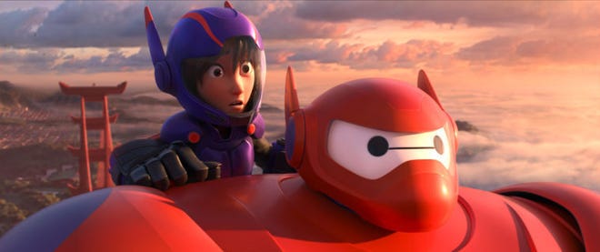 Hiro Hamada, voiced by Ryan Potter, hitches a ride on Baymax, voiced by Scott Adsit, in "Big Hero 6."
