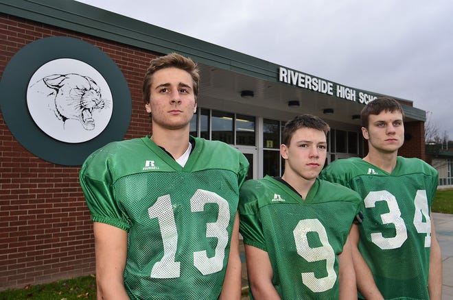 Riverside High School football allstars, from left, Jason Dambaugh, Ricky Wass and Logan Sheridan.