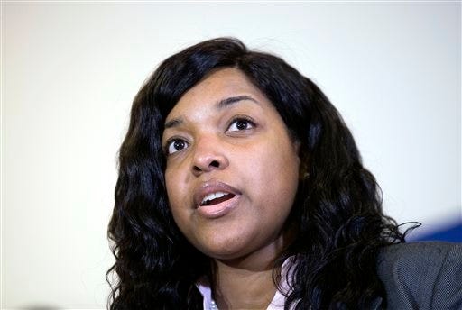 FILE - In this Oct. 28, 2014, file photo, Amber Vinson, 29, the Dallas nurse who was being treated for Ebola, speaks at a news conference after being discharged from Emory University Hospital in Atlanta. Vinson, who flew on a commercial jet before being diagnosed with Ebola, said she wasn't careless or reckless. In an interview Thursday, Nov. 6, 2014, on NBC's "Today" show, Vinson also said she didn't get enough training to feel comfortable treating Ebola patient Thomas Eric Duncan at Texas Health Presbyterian Hospital in Dallas. (AP Photo/David Goldman, File)
