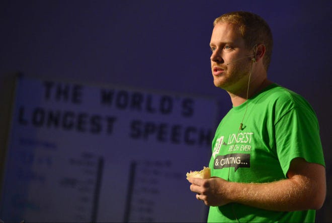 Zach Zehnder gives a sermon and reads passages from the Bible in his attempt to set the record for the world’s longest speech at theCross Mount Dora in Mount Dora on Friday. To beat the current 48-hour, 31-minute record, Zehnder will have to speak past 7:31 a.m. Sunday morning.
