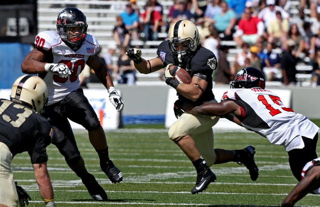 Army's Stephen Fraser, shown running in 2012, hopes to return from a knee injury on Saturday againt UConn at Yankee Stadium. Associated Press