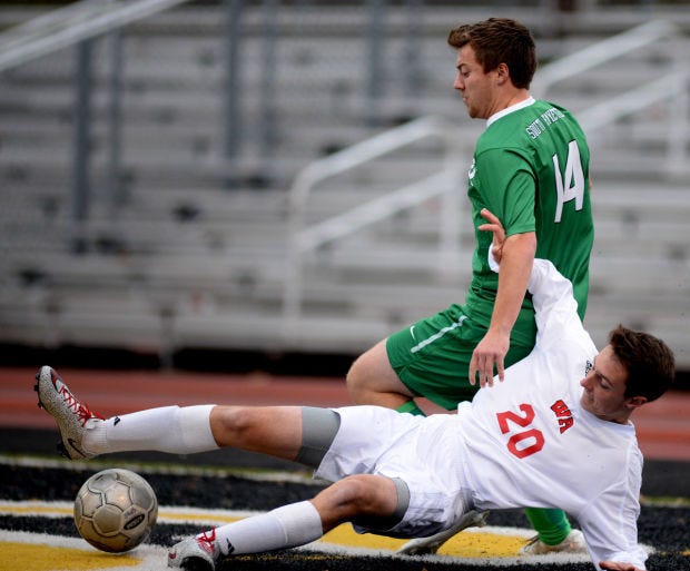 West Allegheny’s Nathan Graziani (20) tries to play the ball during the PIAA soccer quarterfinals on Saturday.