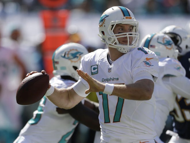 Miami Dolphins quarterback Ryan Tannehill (17) looks to pass during the first half against the San Diego Chargers on Sunday in Miami Gardens.