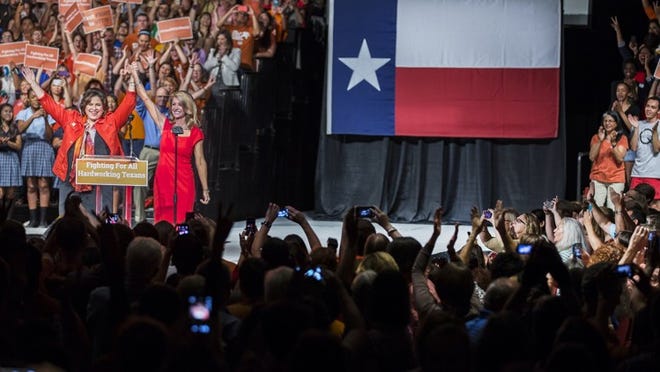 Sens. Wendy Davis and Leticia Van de Putte lost in their respective races for governor and lieutenant governor of Texas last week. In this photo, Davis and Van de Putte wave at supporters at the Palmer Events on June 24, 2014, as they mark the first anniversary of the filibuster against abortion legislation that rocked the Texas Capitol.