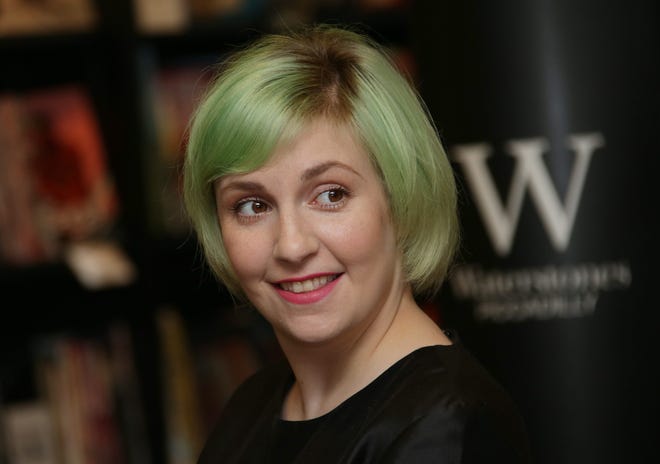 actress Lena Dunham at a London book signing. Her memoir, Not That Kind Of Girl, has drawn criticism from conservative commentators. AP PHOTO BY JOEL RYAN