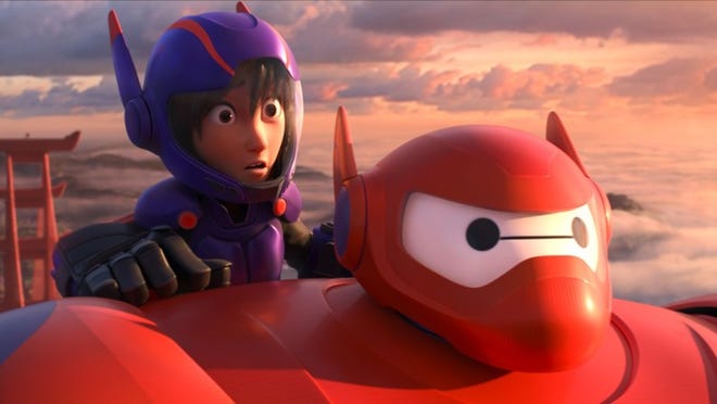This image released by Disney shows animated characters Hiro Hamada, voiced by Ryan Potter, left, and Baymax, voiced by Scott Adsit, in a scene from “Big Hero 6.” (AP Photo/Disney)
