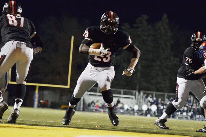 Kaezon Pugh runs into the end zone for his second touchdown during Aliquippa's quarterfinal playoff game against Mt. Pleasant on Friday, November 7, 2014, at Canon-McMillan Stadium.
