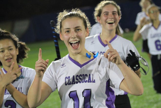 Classical's Tessa Griffin celebrates after her team won the 
Division II field hockey tournament last week.