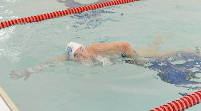 Local avid swimmer Jerry Kanter strokes the water on Nov. 4 at the Woodmen Community Center pool. The 87-year-old won two gold medals for swimming in this year’s North Carolina Senior Games.