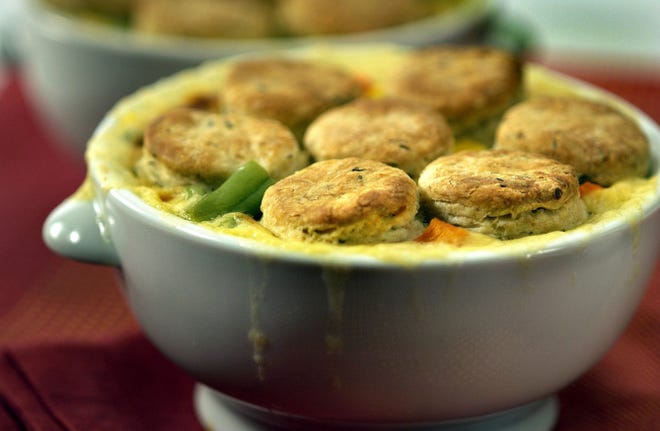 Biscuit-Topped Vegetable Pot Pie is packed iwth green beans, potatoes, carrots and parsnips.