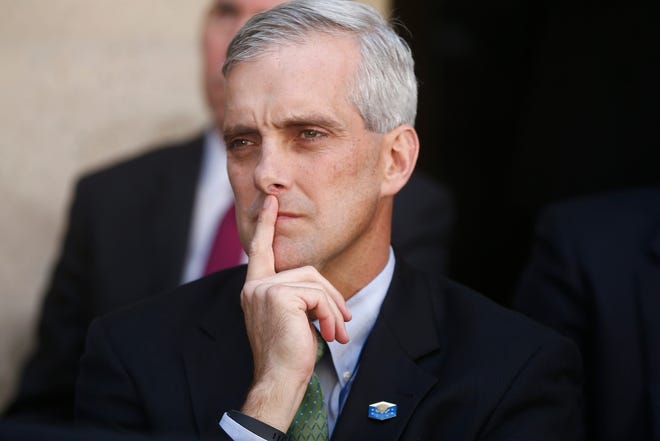 White House Chief of Staff Denis McDonough listens as President Barack Obama speaks at FBI Director James Comey’s installation ceremony at FBI Headquarters in Washington Oct. 28, 2013. File/The Associated Press
