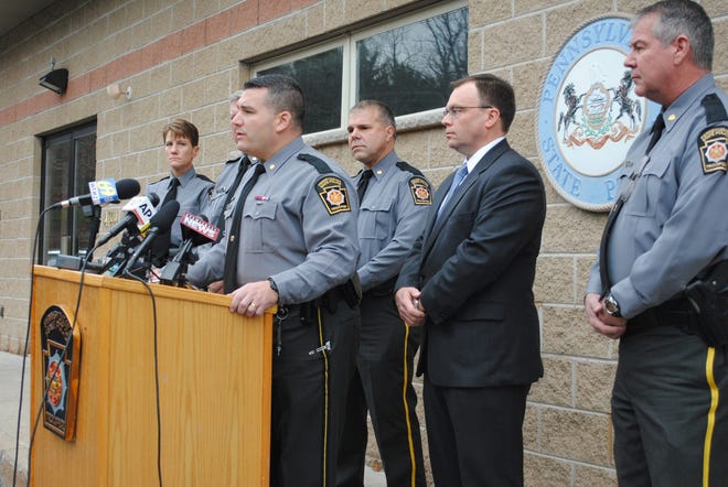 Lt. Christopher Paris speaks Wednesday as the state police station in Blooming Grove, Pa. officially reopens two months after a sniper attack killed one trooper and wounded another. Beth Brelje/Pocono Record
