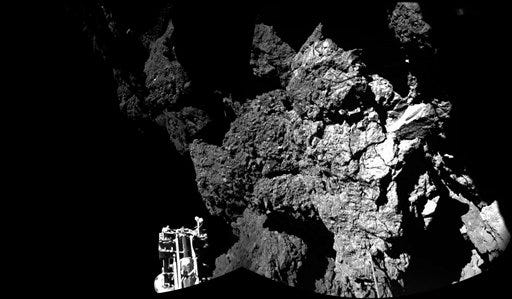 The combination photo of different images taken with the CIVA camera system released by the European Space Agency ESA on Thursday Nov. 13, 2014 shows Rosetta's lander Philae as it is safely on the surface of Comet 67P/Churyumov-Gerasimenko, as these first CIVA images confirm. One of the lander's three feet can be seen in the foreground. Philae became the first spacecraft to land on a comet when it touched down Wednesday on the comet, 67P/Churyumov-Gerasimenko. (AP Photo/Esa/Rosetta/Philae)