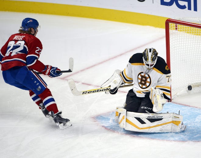 Canadiens right wing Dale Weise scores against Bruins goalie Niklas Svedberg on a penalty shot during the second period on Thursday in Montreal. RYAN REMIORZ/THE CANADIEN PRESS VIA AP