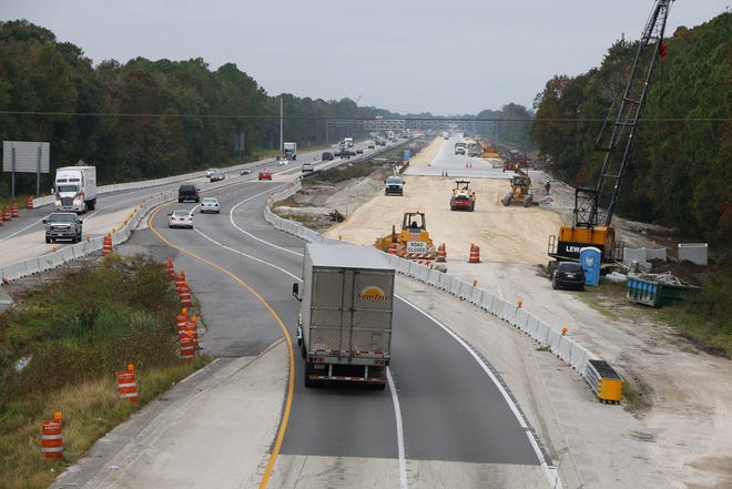 Looking west from the Tomoka Farms Road bridge over Interstate 4, a widening project continues near I-95 in Daytona Beach on Friday.