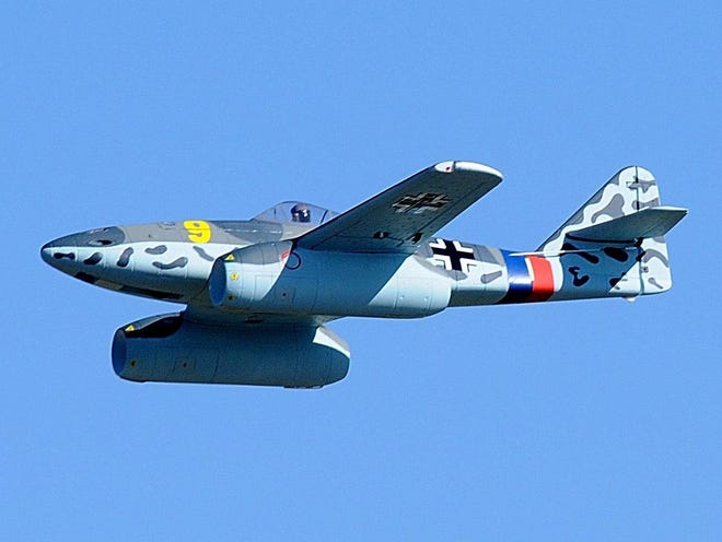 Mike Fitzpatrick flies his Messerschmitt ME-262 German jet fighter over the flightline at the R/C Festival of the Giants in DeLand on Friday, Nov. 14, 2014. The scale model radio-controlled airplane show continues Saturday and Sunday with access off Marsh Road at the Sperling Sports Complex.