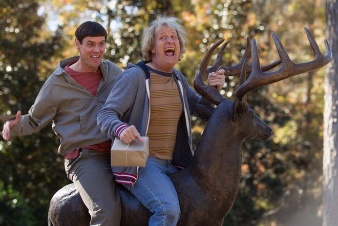 Lloyd (Jim Carrey, left) and Harry (Jeff Daniels) are on a mission in "Dumb and Dumber To." HOPPER STONE/UNIVERSAL PICTURES