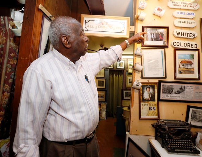 Thomas Linton talks about items he saved from the Civil Rights movement in a room that was formerly a beauty shop inside Howard & Linton's Barbershop on T.Y. Rogers Jr. Avenue in Tuscaloosa Tuesday, Nov. 11, 2014. Linton will be celebrated Saturday, Nov. 15 at 5 PM in the Northport Civic Center for his role in the civil rights movement. Michelle Lepianka Carter | The Tuscaloosa News