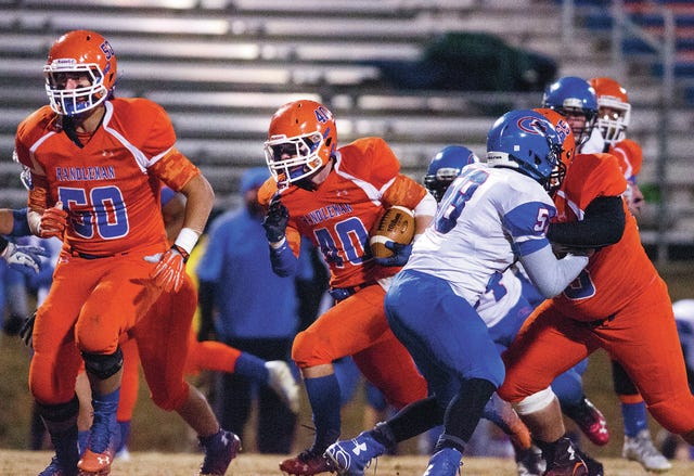 A NICE GAIN — Spencer Hamilton finds some running room against Greene Central Friday night.