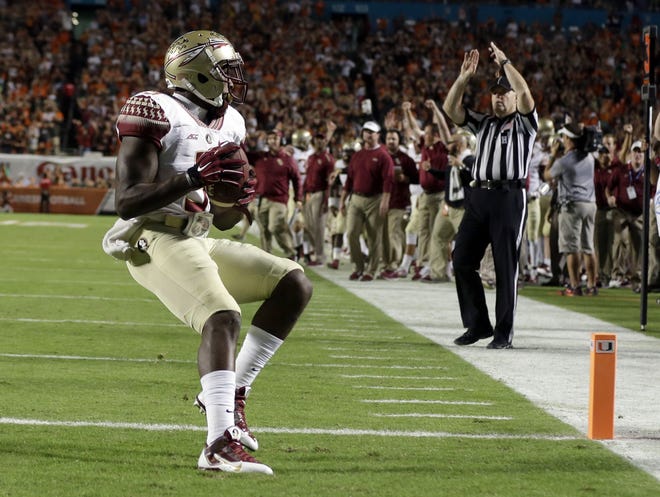 Florida State running back Karlos Williams scores a touchdown during the second half of Saturday's game at Miami.