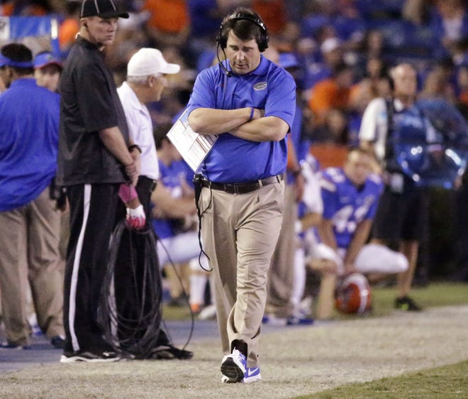 Florida head coach Will Muschamp paces the sidelines during the second half of a game against Missouri in Gainesville.