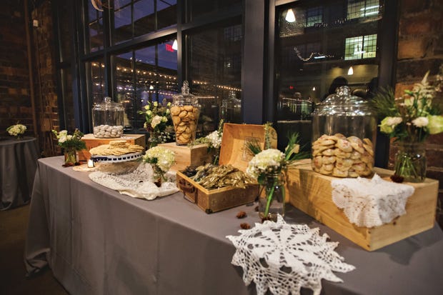 dock580 catered Simone and Noah Brader's winter wedding, where guests enjoyed a dessert table featuring their favorite sweet treats.