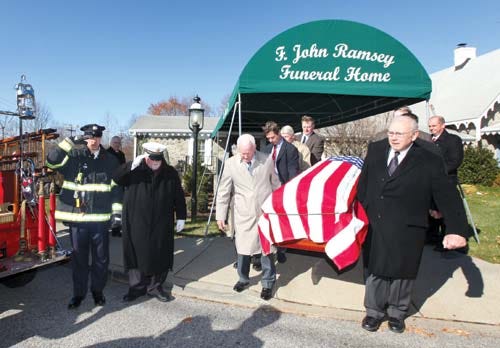 Photo by Daniel Freel/New Jersey Herald Pallbearers carry the casket of former state Sen. Robert E. “Bob” Littlell from the F. John Ramsey Funeral Home in Franklin after the late legislator’s funeral service Tuesday.