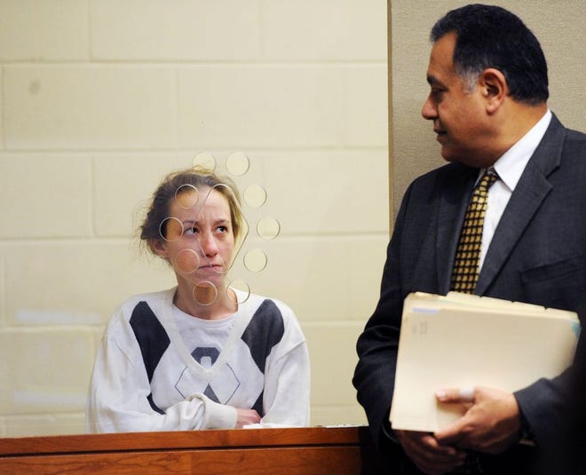 Jacqueline Cordaro of Brockton and her attorney, Emad Abdelmessih, appear in Brockton District Tuesday. Cordaro tried to escape from the city's District Court Monday by climbing through a ceiling, but fell into a busy courtroom instead.