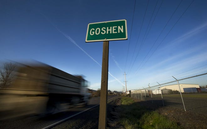 A truck rumbles north on Highway 99 through Goshen on Monday, November 17, 2014. (Andy Nelson/The Register-Guard)