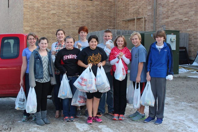 If a student brought 5 items to donate, they were admitted to the event for free said Julian Hoey, CMS Student Council president, pictured here on the far right.