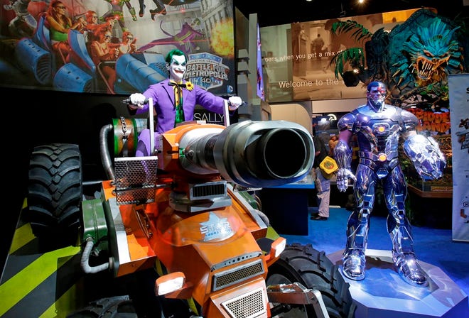 Animatronic characters are seen at the Great American Dark Ride Company booth at the International Association of Amusement Parks and Attractions convention and trade show in Orlando.