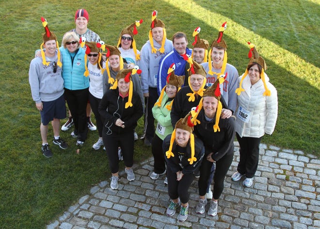 Team Little Big Farm Friends of York, Maine, will again join this year’s Seacoast Rotary Turkety Trot 5K on Thanksgiving. The team dons turkey hats and runs in memory of family member and friend, Anne Bradenburger, who died 10 years ago from a berry aneurysm. Ned Thompson photo