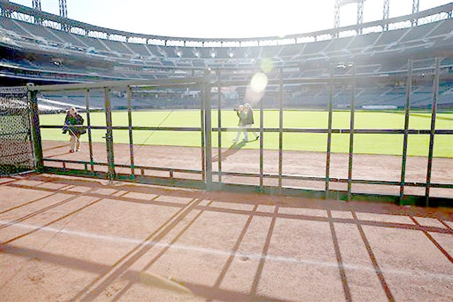 A white chalk line marks the location of the prior season's outfield wall at Citi Field in New York. 



AP Photo/Seth Wenig