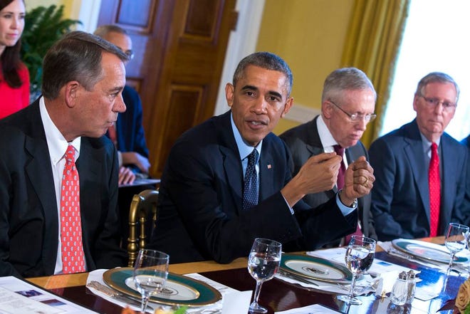 FILE - In this Nov. 7, 2014 file photo, President Barack Obama meets with Congressional leaders in the Old Family Dining Room of the White House in Washington. From left are, House Speaker John Boehner of Ohio, Obama, Senate Majority Leader Harry Reid of Nev., and Senate Minority Leader Mitch McConnell of Ky. Republican leaders and President Barack Obama say the message of the midterm elections is clear: Voters want them to work together. But on what? The two parties’ voters, like their politicians, are far apart on health care, immigration and climate change, exit polls show. The voters can’t even agree on whether the economy is looking worse or getting better.(AP Photo/Evan Vucci, File)