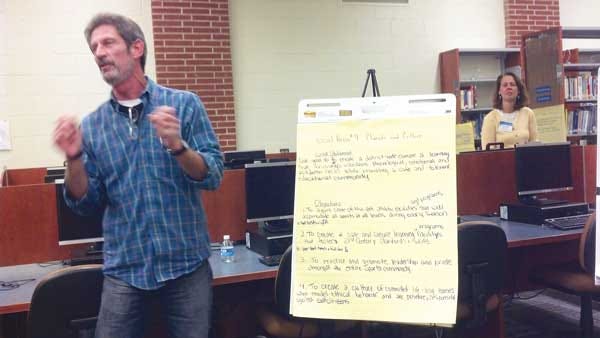 Photo by Eric Obernauer/New Jersey Herald Andrew Lowery, an English teacher at Sparta High School, presents goals in the areas of school climate and culture at the Sparta Board of Education’s final strategic planning meeting Wednesday.