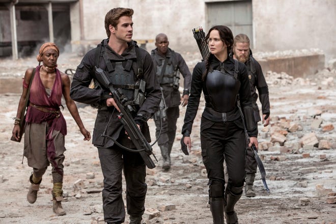 Commander Paylor (Patina Miller), Gale Hawthorne (Liam Hemsworth), Boggs (Mahershala Ali), Katniss Everdeen (Jennifer Lawrence), and Pollux (Elden Henson) in "The Hunger Games: Mockingjay Part 1." MURRAY CLOSE/LIONSGATE/MCT