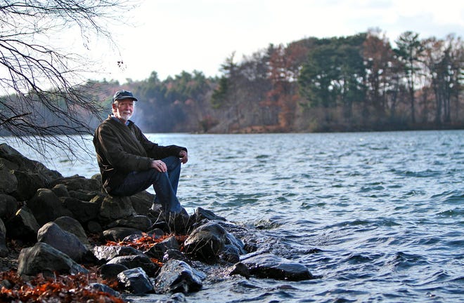 Mike Ryan, outgoing Executive Director of the Friends of the Middlesex Fells, poses on the shores of Spot Pond Tuesday Nov. 18. Wicked Local Staff Photo / Nicole Goodhue Boyd