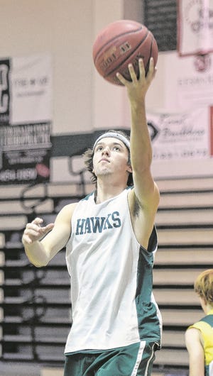 South Walton's Paxton Dixon goes up for a layup