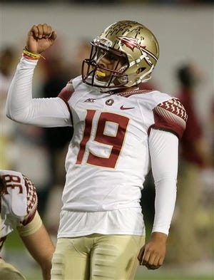 Florida State place kicker Roberto Aguayo celebrates after kicking a field goal during the second half of an NCAA College football game against Miami, Saturday, Nov. 15, 2014 in Miami Gardens, Fla. Florida State defeated Miami 30-26.
