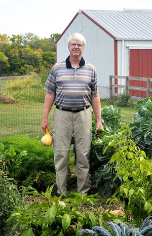Phil Roudebush, a veterinarian retired from Hill's Pet Nutrition, is among those participating in the Shawnee County Extension Master Gardener program. The volunteers, who must complete hours of training, are considered representatives of Kansas State University with the mission of providing research-based information to the public.