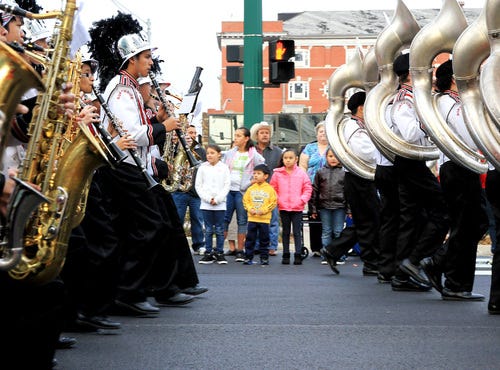 TIMES RECORD FILE PHOTO / The Northside High School marching band makes its way down Garrison Avenue, Saturday, December 08, 2012, in the annual Fort Smith Christmas Parade.