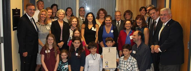 Parents and professionals, representing Decoding Dyslexia – Massachusetts (DD-MA), invited legislators to learn more about the neurological causes and detectable signs of dyslexia. Included in the group is Marshfield resident Kathy Brown and Susan Moyse with Rep. James Cantwell's legislative aide Ben Thomas and other Mass legislators. 

Courtesy Photo